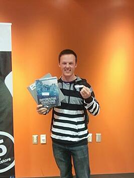 Ryker Eads with his free books. 