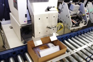 A book going through the i-Pack.